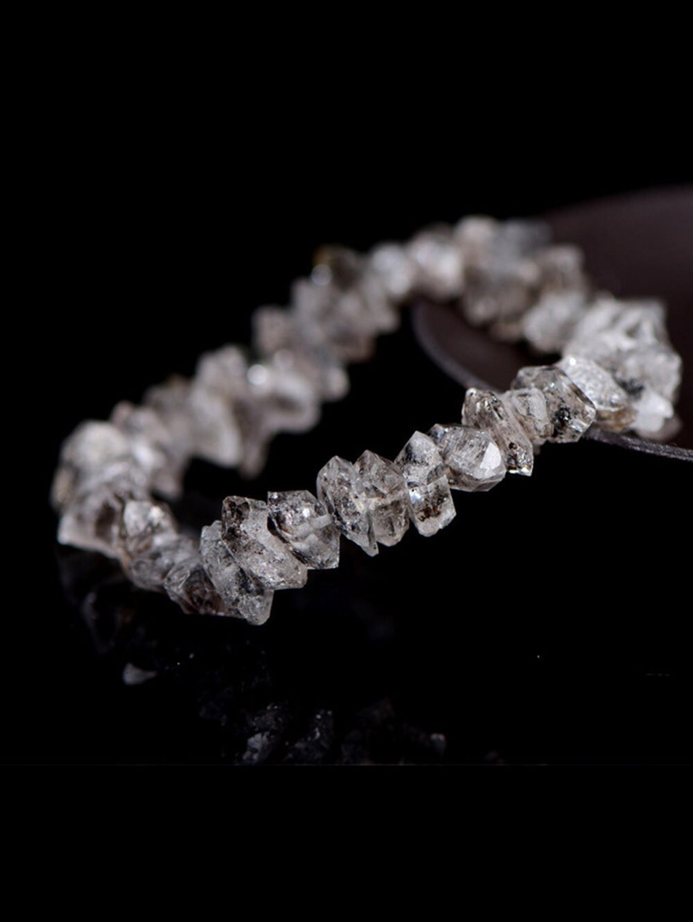 Exquisite Herkimer Diamond Bracelet featuring natural, radiant crystals with a diamond-like cut and captivating geometric facets.