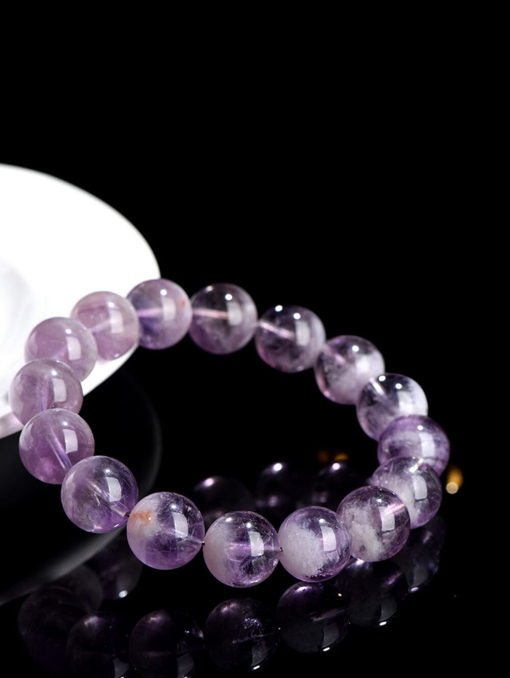 Natural Lavender Amethyst Bracelet from Brazil, featuring soft lavender hues and delicate, cloud-like inclusions.